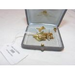 A 9ct gold 'fox' brooch together with earrings etc