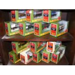 Two shelves of boxed collectable die-cast lorries