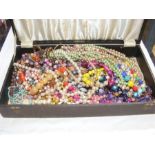 Selection of costume jewellery, necklaces, etc.