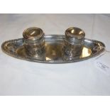 A silver and cut glass double inkwell stand