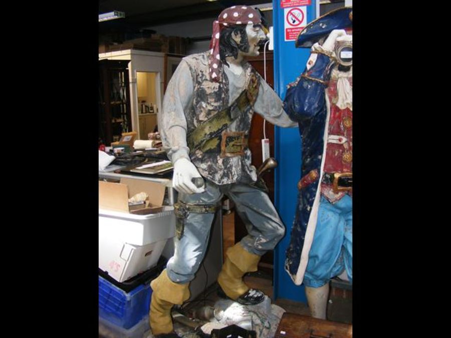 A fibreglass figure of pirate with dagger - height