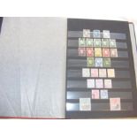 An album bearing a collection of stamps from the I