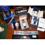 A selection of boxed and loose gents wrist watches