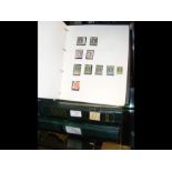 An album containing stamps relating to Canada, tog