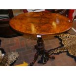 A Victorian oval figured walnut occasional table o