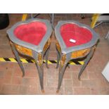 A pair of French style heart shaped display cabine