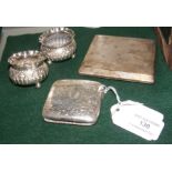 A silver vesta case, a silver cigarette case and t