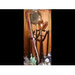An oak umbrella stand together with two bed pans a