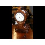 An Edwardian inlaid mantel clock - 27cms high