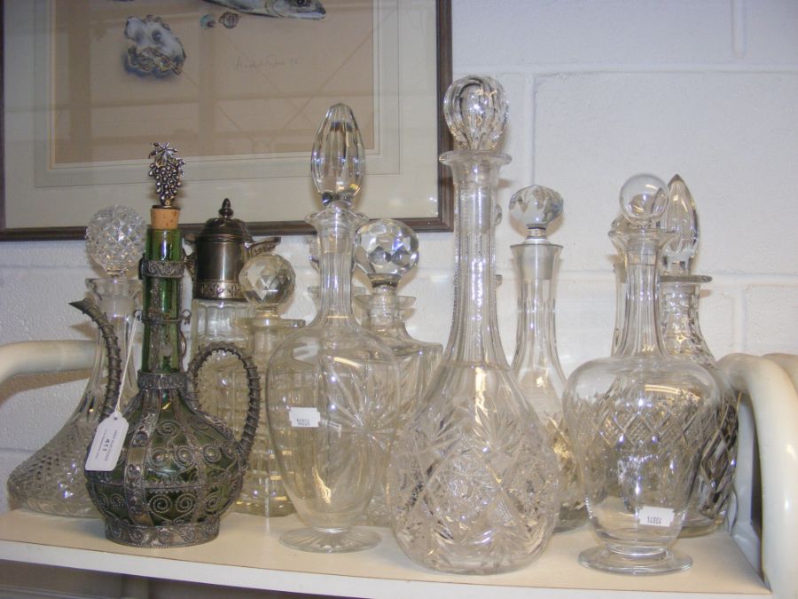 A cluster of cut glass decanters