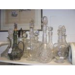 A cluster of cut glass decanters