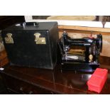 A vintage Singer electric sewing machine - Model N