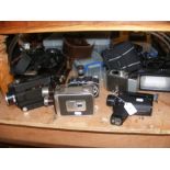 A number of vintage film cameras including Hanimex