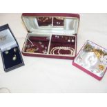 Three small boxes of costume jewellery including e