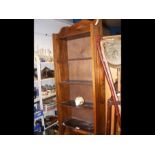 A narrow oak bookcase with five shelves - width 45