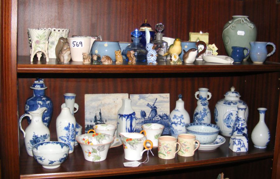 Two shelves of collectable china and porcelain inc