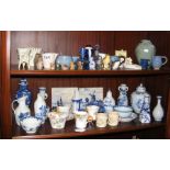 Two shelves of collectable china and porcelain inc