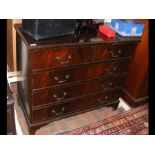 A reproduction inlaid mahogany chest of two short