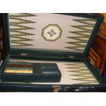 A backgammon set with interesting tapestry base