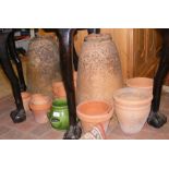 A pair of terracotta rhubarb forcers together with