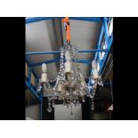A five branch crystal drop chandelier
