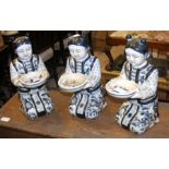 A set of three modern ceramic figures of Japanese