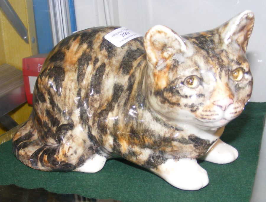 A Winstanley cat ornament with glass eyes - 30cm l