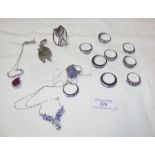 A collection of silver rings and other jewellery