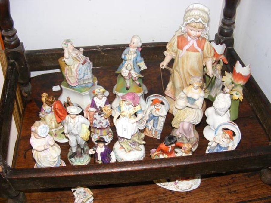 A selection of Continental antique figurines