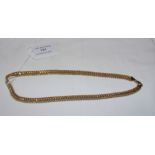 A 9ct gold necklace - length 28cm