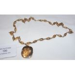 A 9ct gold locket on 9ct gold oval link chain - le