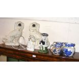 A pair of Staffordshire dog ornaments, blue and wh
