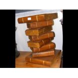 A carved wood stack of books