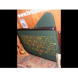 A mobile roulette table featuring Grosvenor Casinos felt