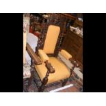 An antique armchair with barley twist stretcher an