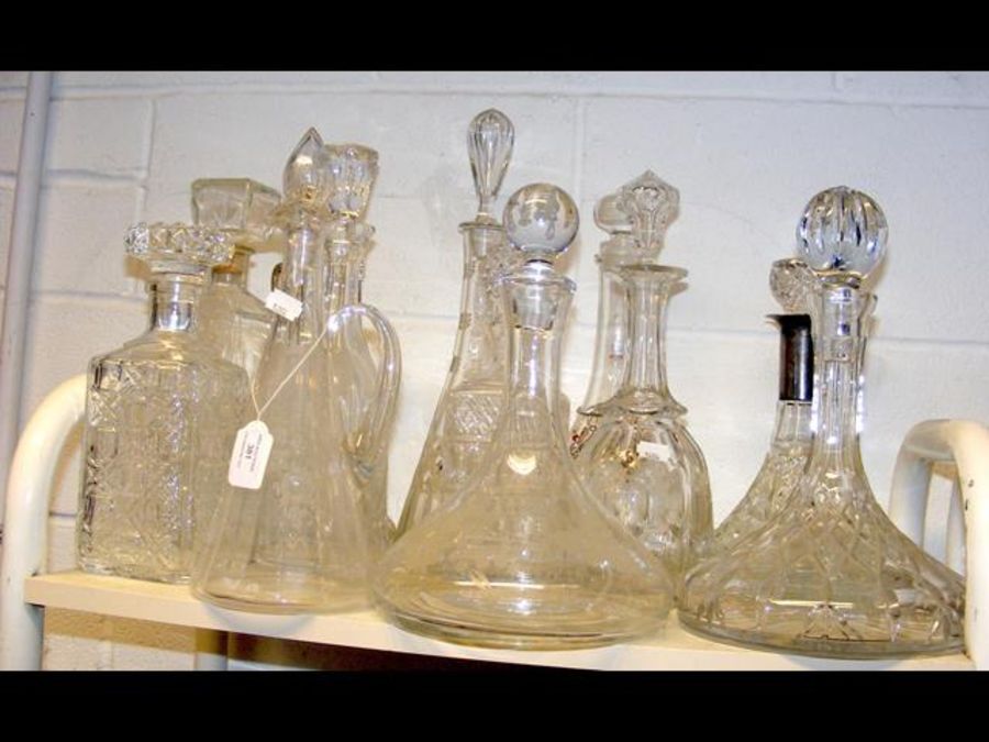 A cluster of cut glass decanters