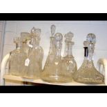 A cluster of cut glass decanters