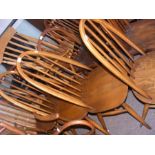 A set of four Ercol dining chairs