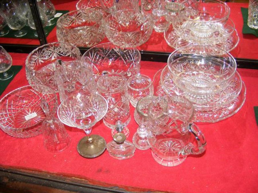 A selection of cut glass ware including bowls, jug