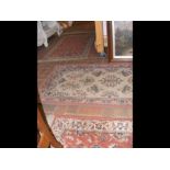Six rugs of varying size and pattern