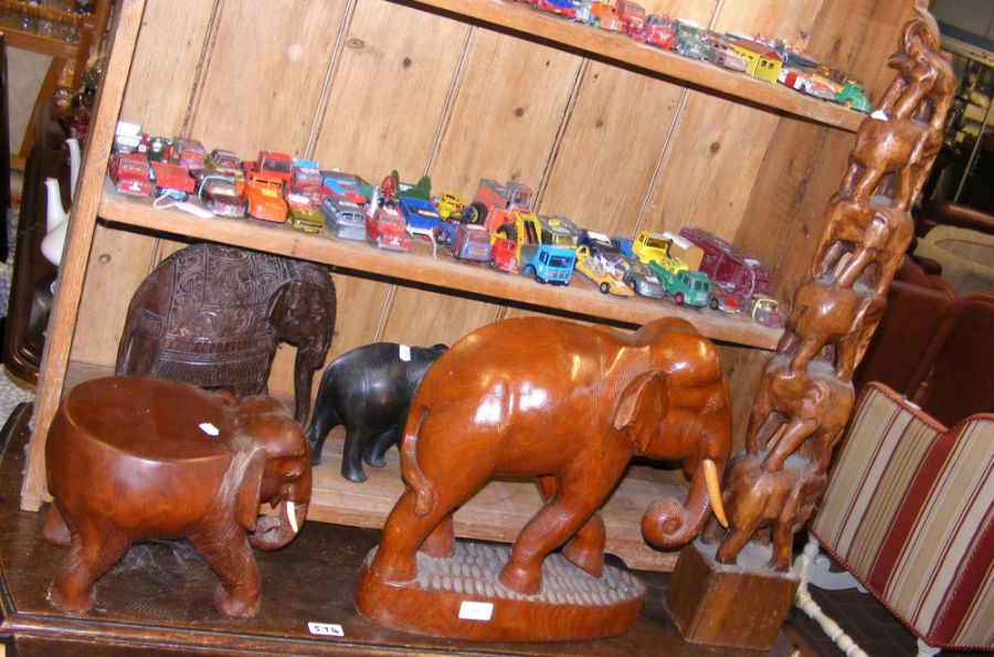 A selection of carved wooden elephants