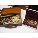 A small case of costume jewellery together with a