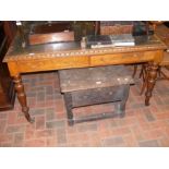 A Victorian oak desk with four drawers to the apro