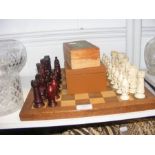 A chess board and character chess pieces, together