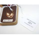 A pair of 9ct gold drop earrings mounted with Came