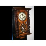 Antique wall clock with chiming movement