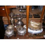 An assortment of silver plated serving ware