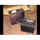 A Vox acoustic guitar amplifier (AGA30) - in box