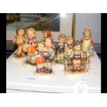 Seven Goebel Hummel porcelain figurines