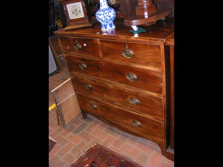 A 19th century mahogany chest of two short and thr